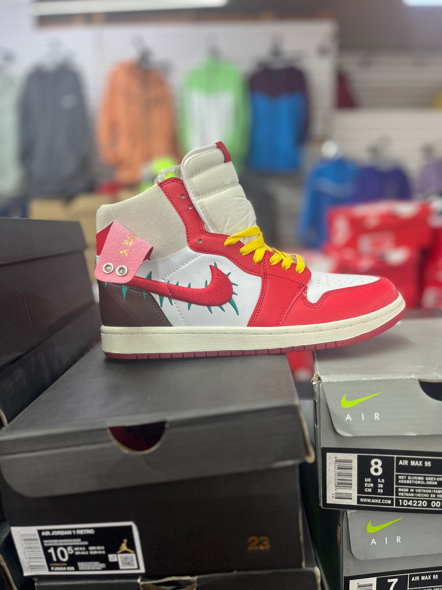 Air Jordan 1 x Teyana Taylor Zoom "A Rose From Harlem" sneakers.